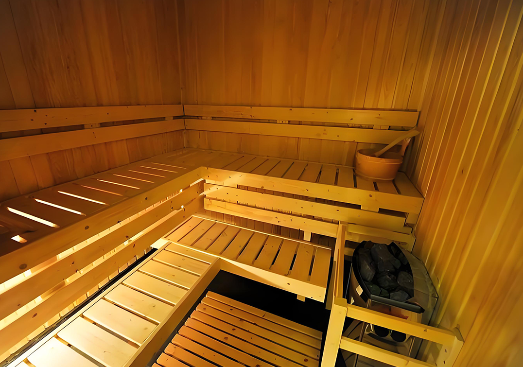 Traditional wooden sauna structure showing heat retention design